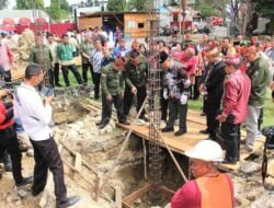 Pj Bupati Barsel Lakukan Peletakan Batu Pertama Pembangunan Rumah Betang DAD Kabupaten Barsel